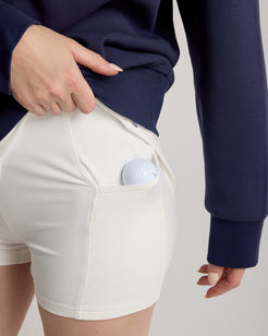 Jupe Lexie KROWN en blanc - détail poche avec balle de golf - jupe golf femme poche intégrée