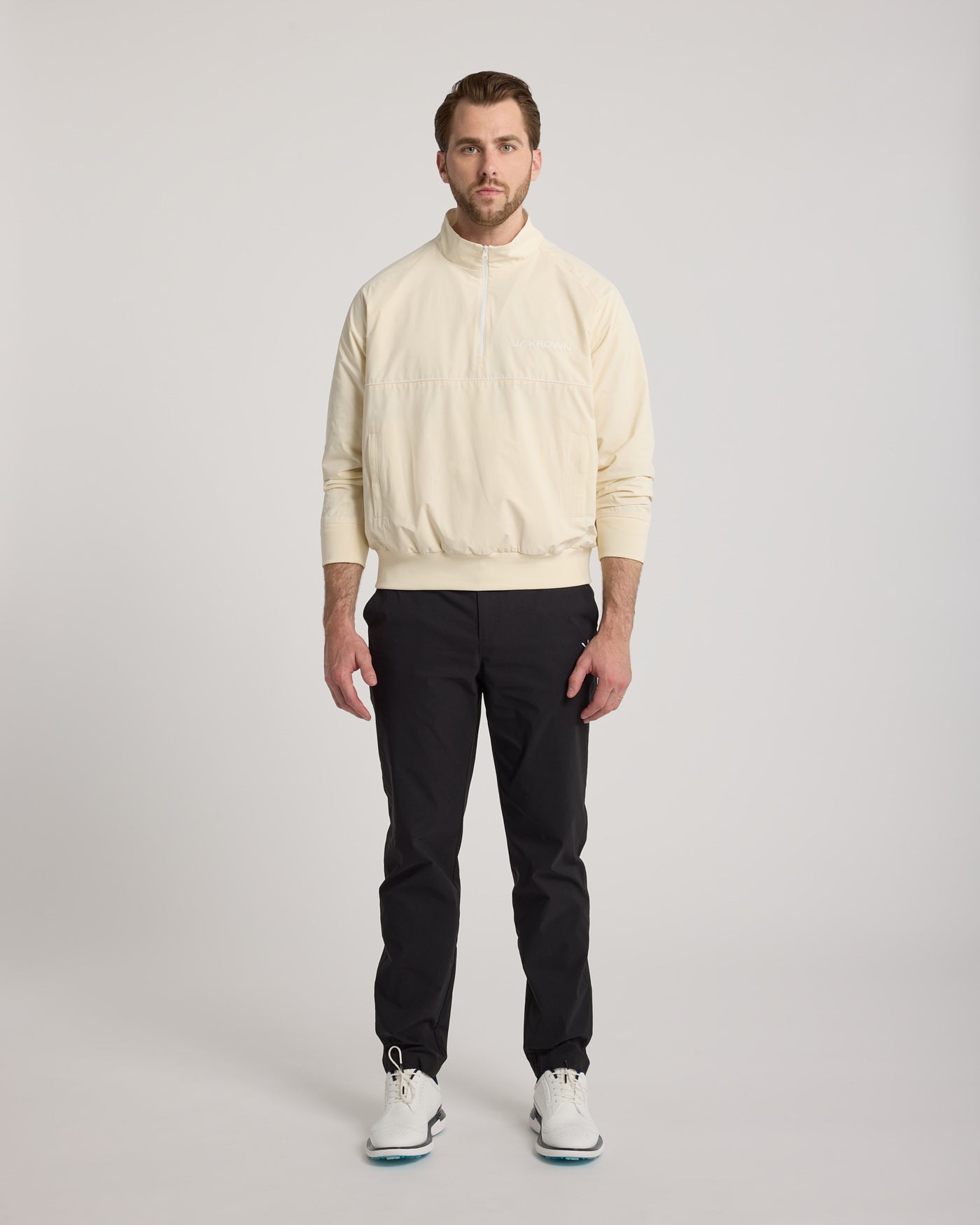 Coupe-vent Noah KROWN unisex coloris Beige - vue de face - veste de golf légère homme femme
