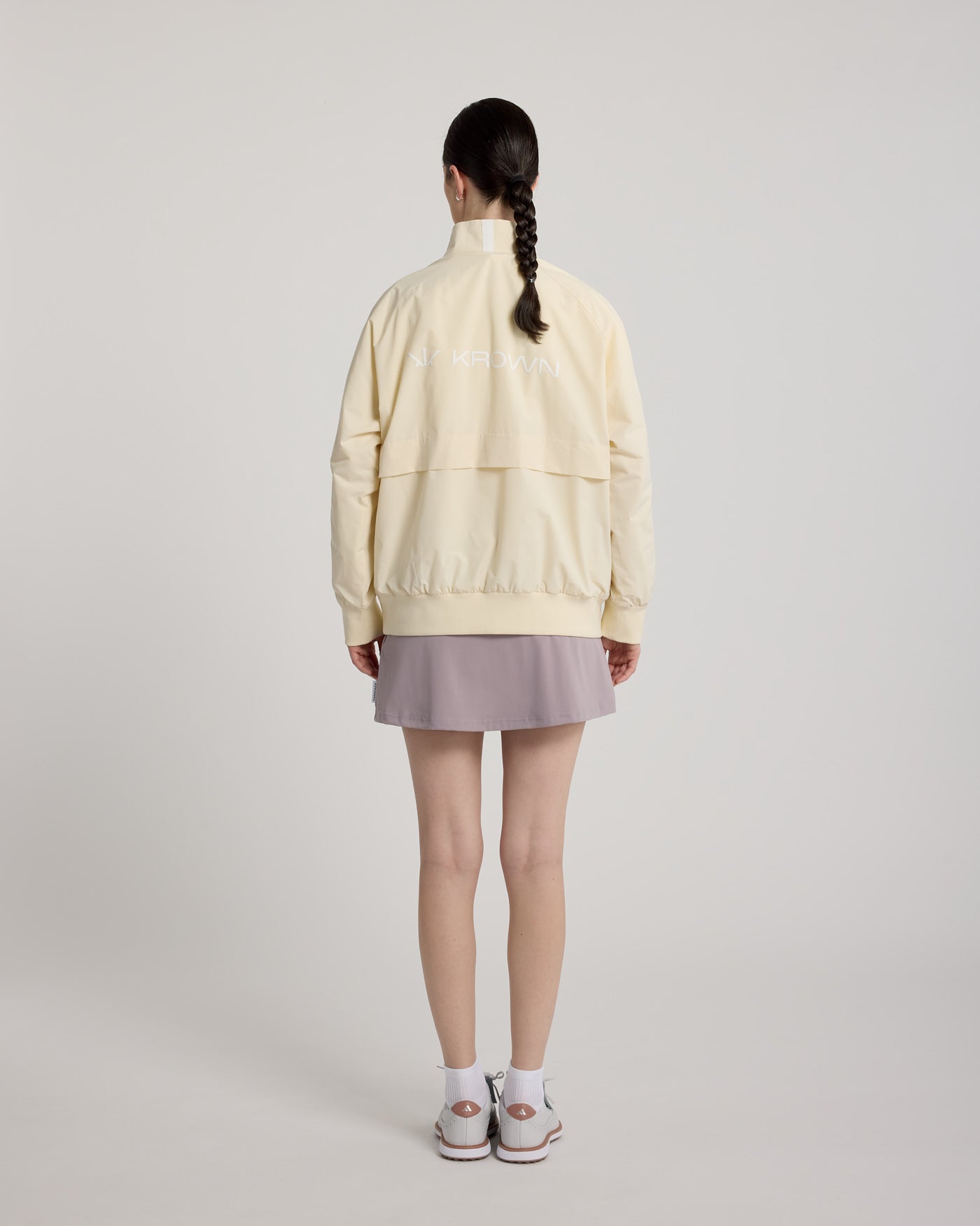 Coupe-vent Noah KROWN unisex coloris Beige - vue de dos femme - coupe-vent golf unisex superposition