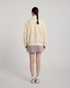 Coupe-vent Noah KROWN unisex coloris Beige - vue de dos femme - coupe-vent golf unisex superposition