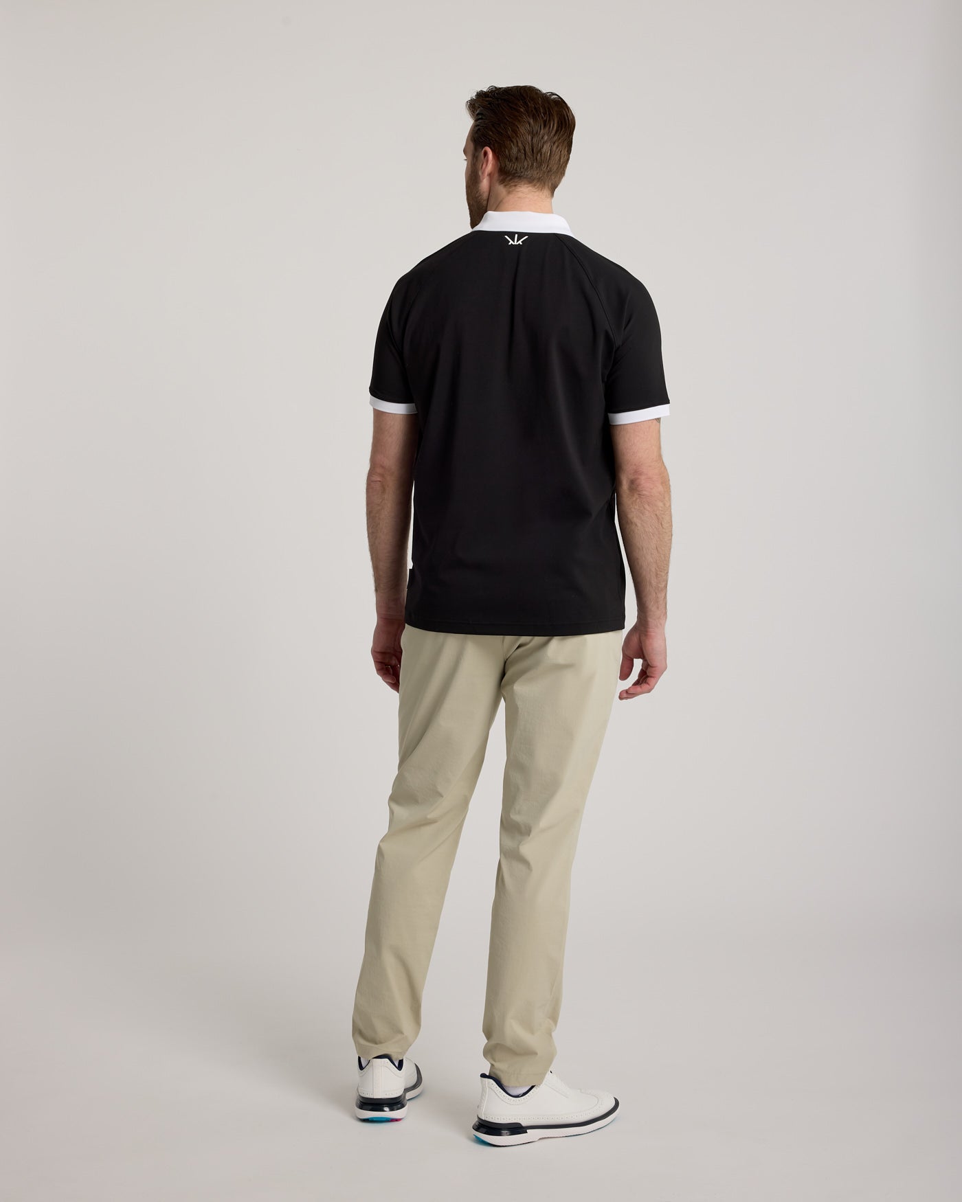 Polo de golf homme noir vue dos – coupe classique manches courtes – Golf Krown